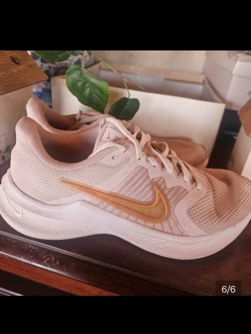 Nike Women’s Light Pink Athletic Sneakers with Gold Swoosh